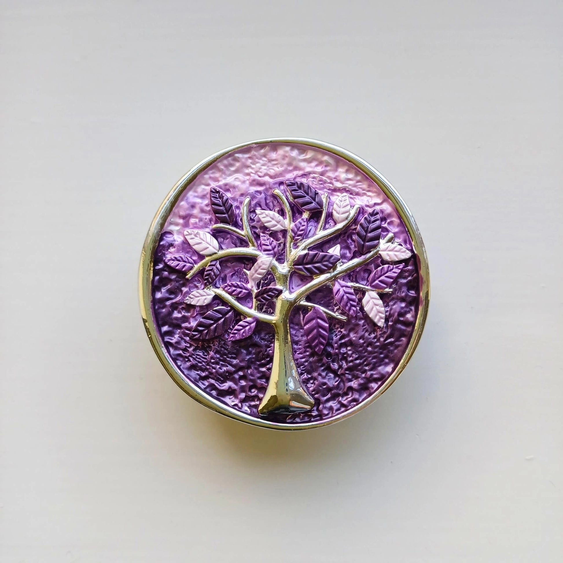colourful tree of life magnetic brooch purple on wooden background
