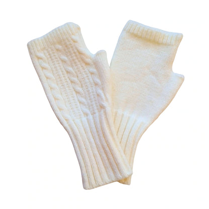 cream wool blend cable knit fingerless gloves on a white background