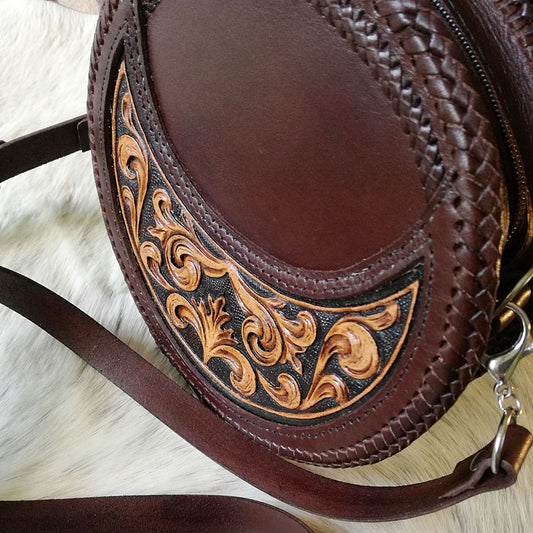 Florencia round tooled leather crossbody bag with floral scroll design