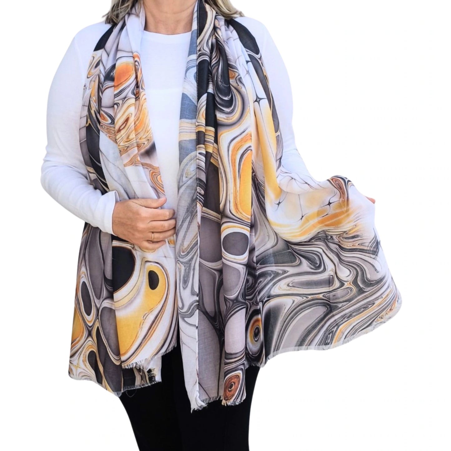 Lightweight marble style scarf in orange and grey shown draped at the front