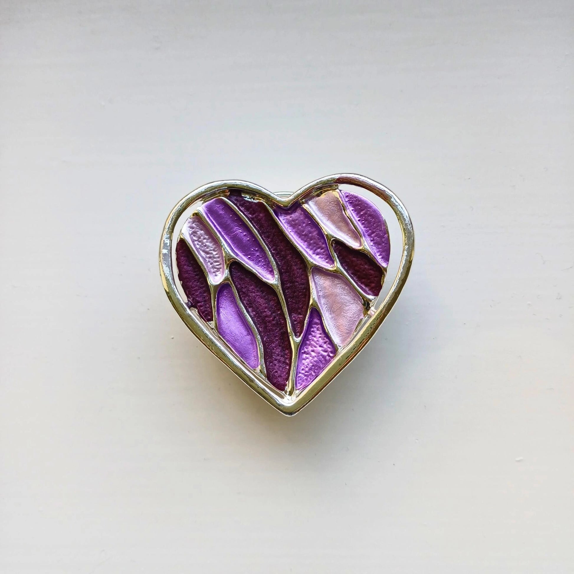 mosaic heart magnetic brooch purple on wooden background