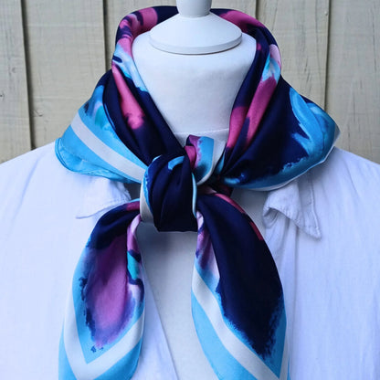 Navy blue floral silky feel square scarf tied on mannequin
