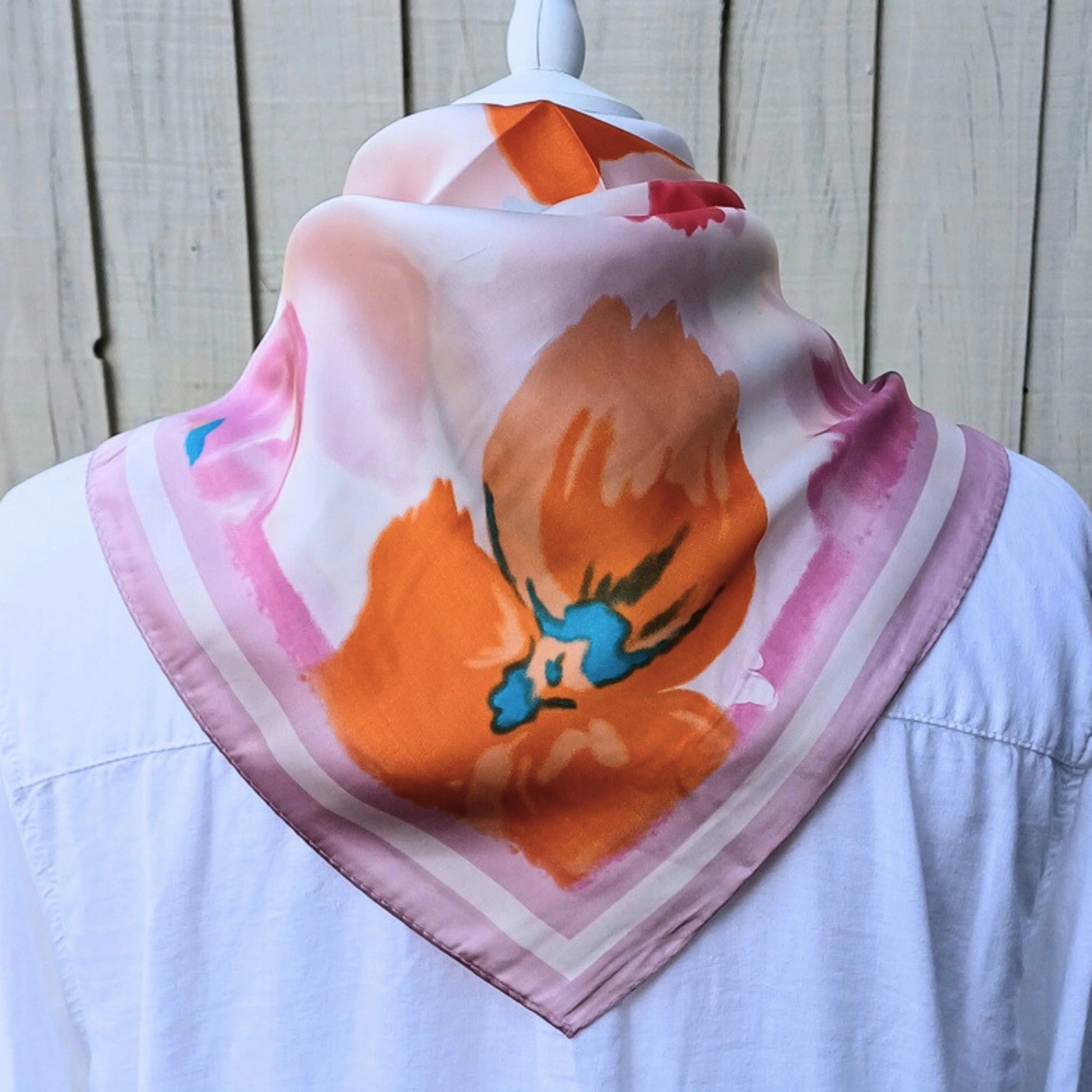 Pink orange floral silky feel square scarf styled with white shirt