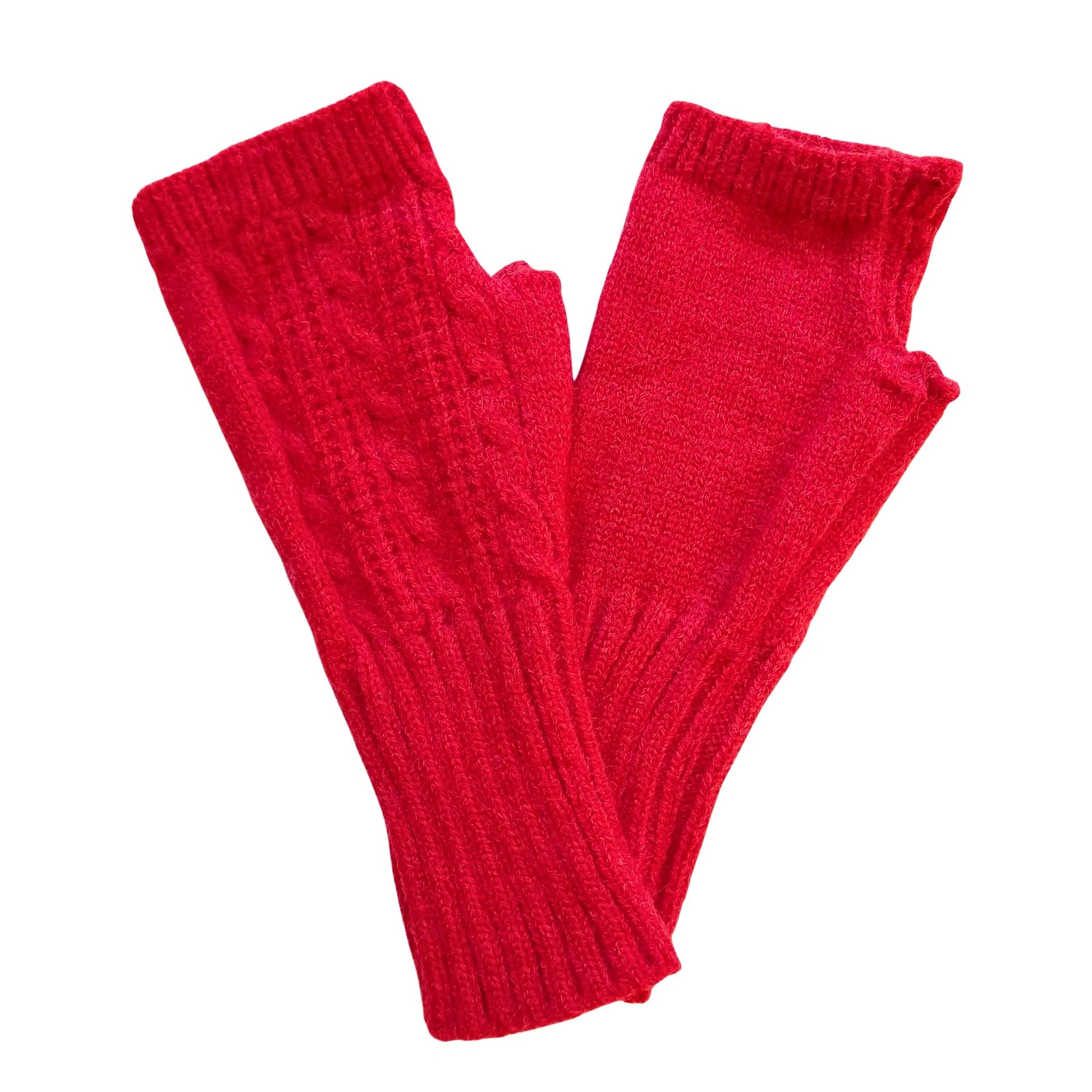 red wool blend cable knit fingerless gloves on a white background