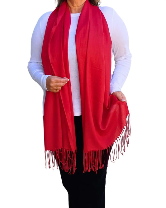 Model wearing red pashmina shawl – soft lightweight wrap with tassels, UK brand