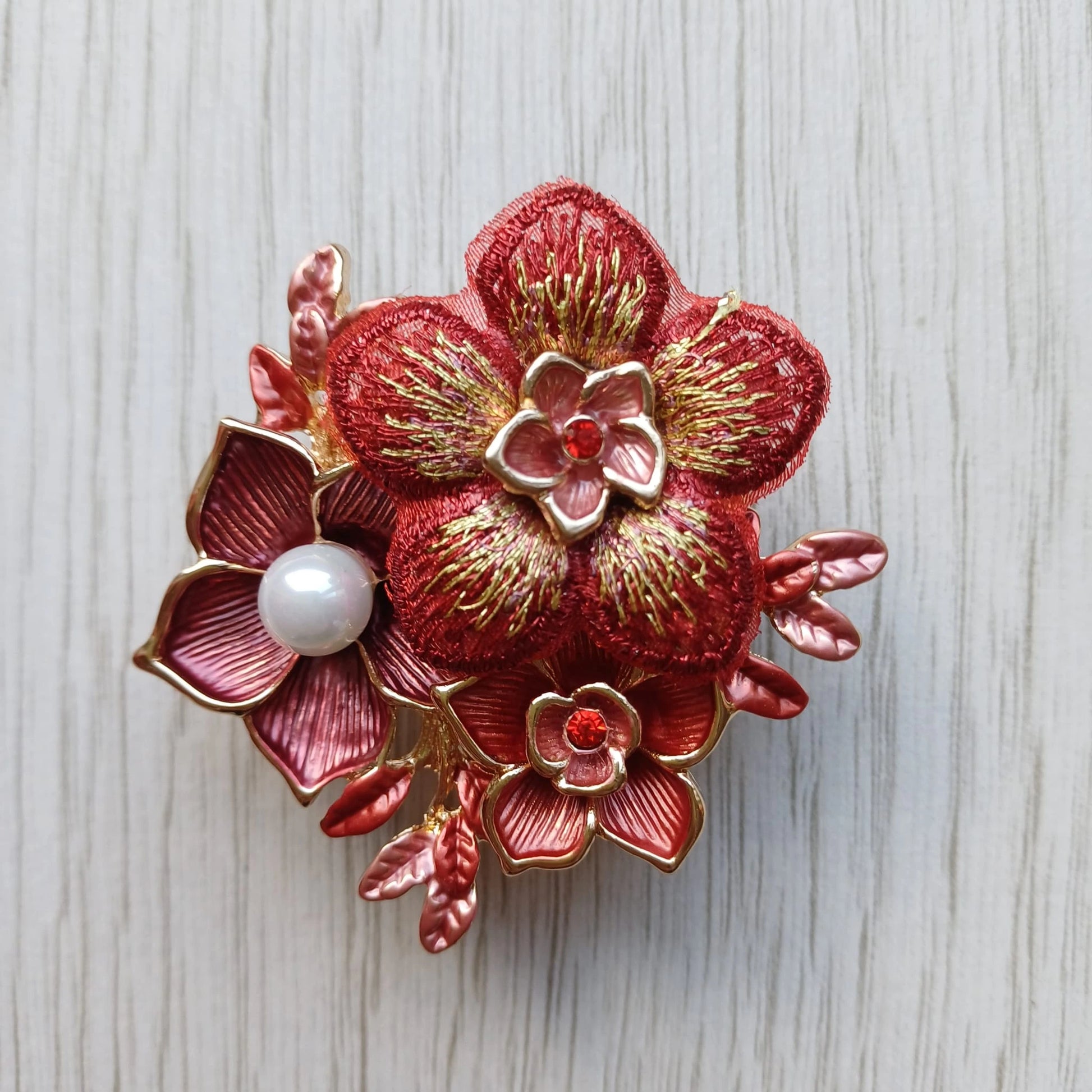 Red magnetic floral brooch with pearl detail for scarves jackets and wedding guest outfits