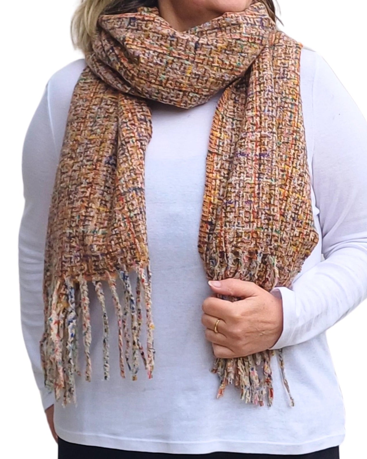 Soft woven taupe beige winter scarf with tassels from Auroras Array wrapped around the neck ideal for winter layering