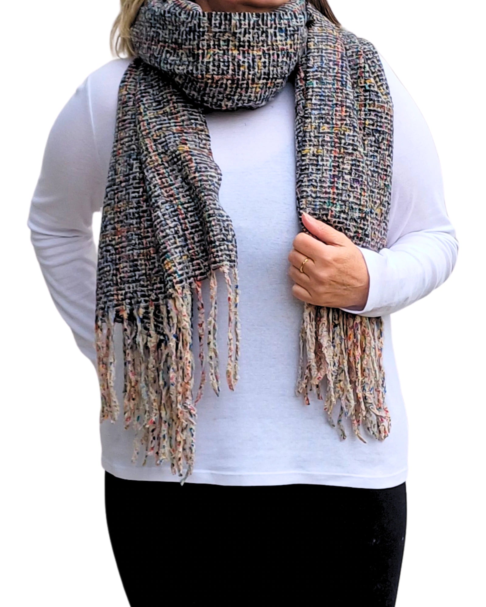 Black mix tweed blanket scarf styled wrapped around the neck.