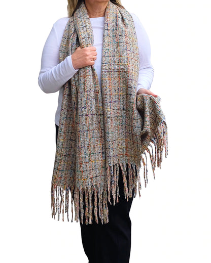 Grey mix tweed blanket scarf with tassels, displayed full length on model.