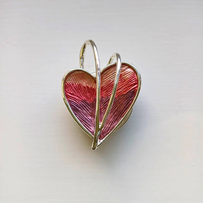 wrapped heart magnetic brooch red on wooden background